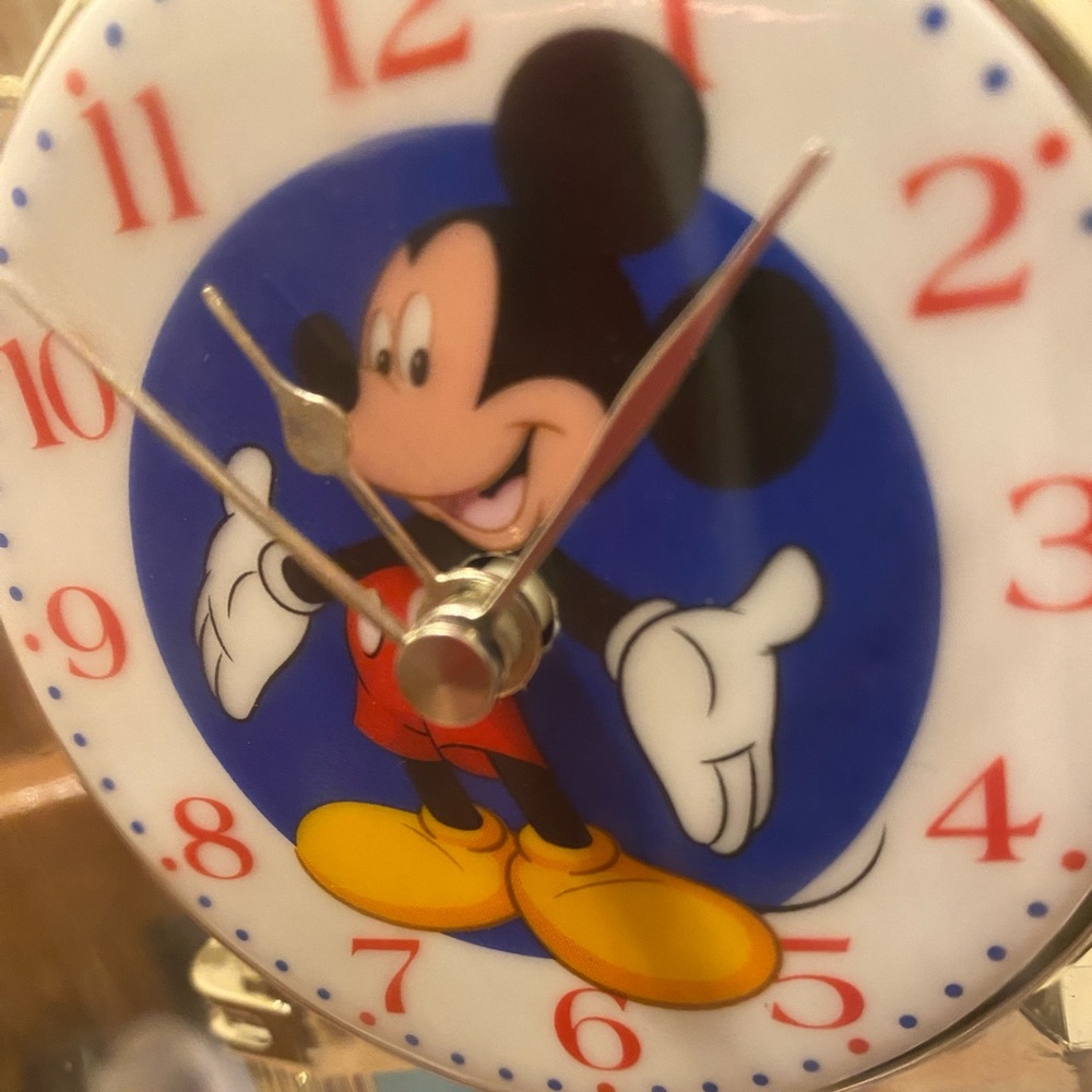 Mickey Mouse with his perpetual motion clock that works!